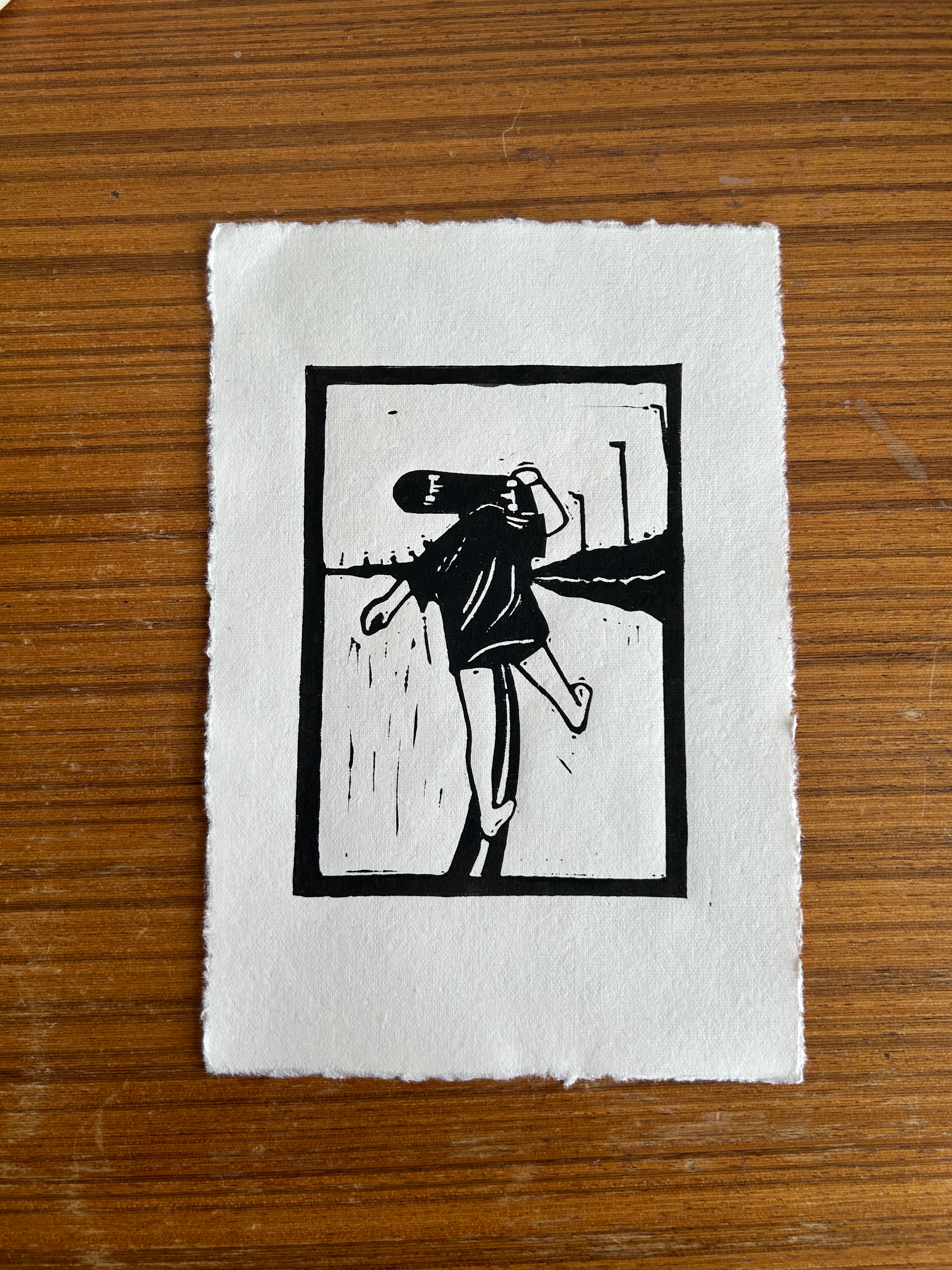 'Girl Carrying Skateboard' A5 Linocut Print