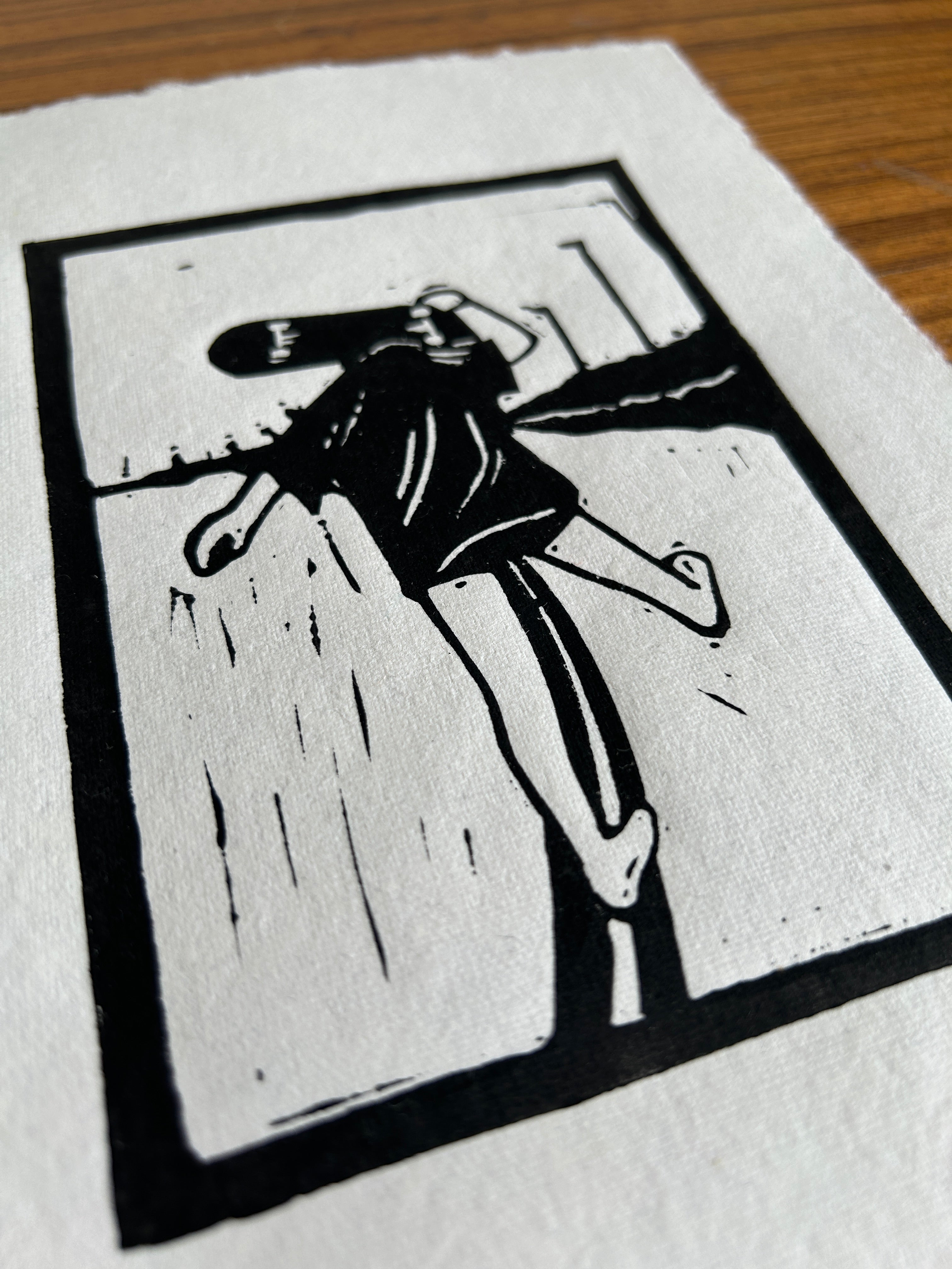 'Girl Carrying Skateboard' A5 Linocut Print